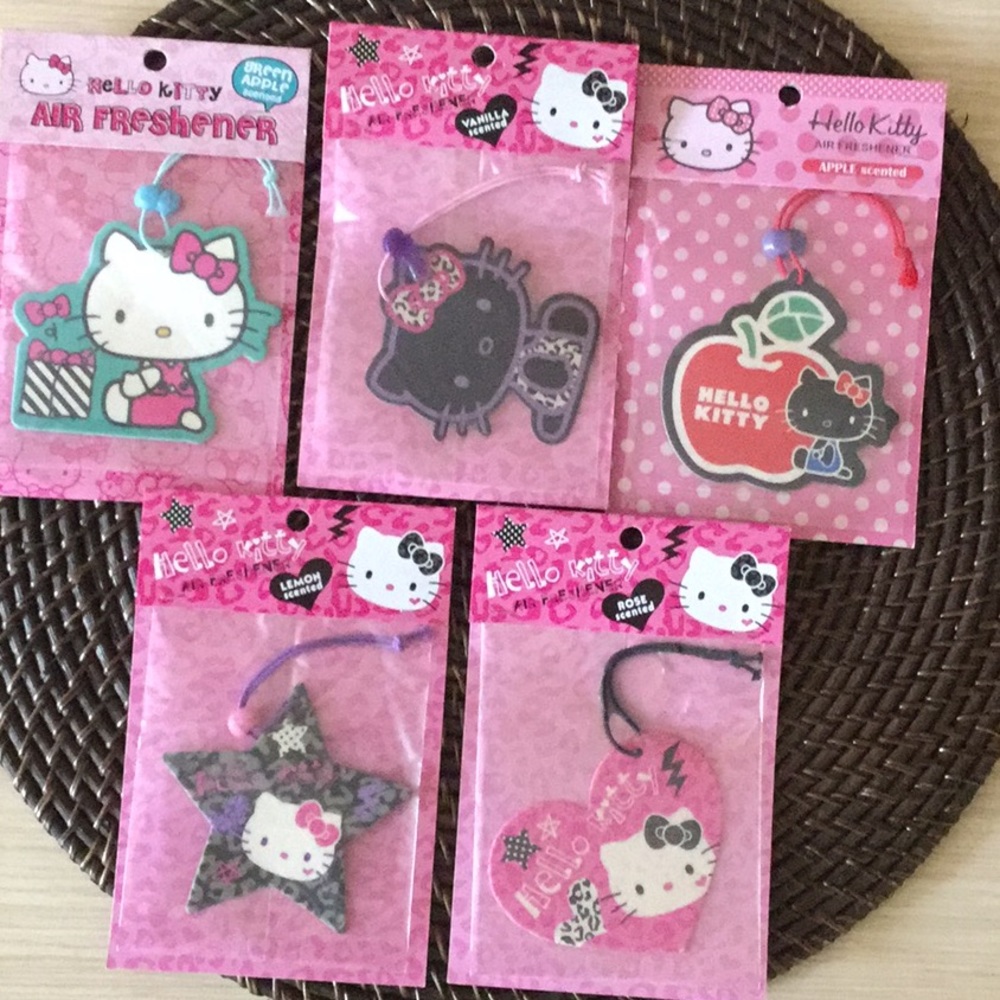 5 Hello Kitty air fresheners,(2 star, 2 black, and 1 apple)